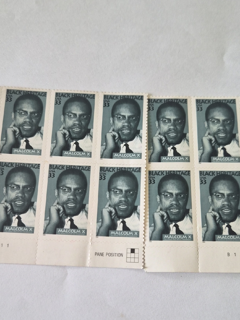 Malcolm X Black Heritage 33¢ Stamp Plate Strip - Teal/Black